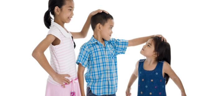 children with different sizes, isolated on white background