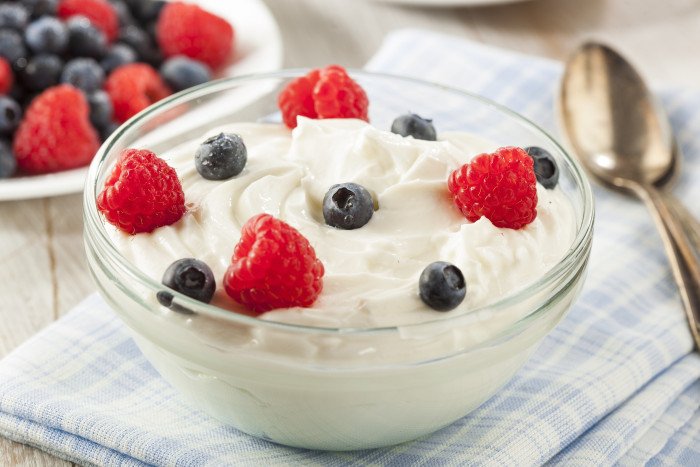 Fresh Organic Healthy Yogurt with Raspberries and Blueberries