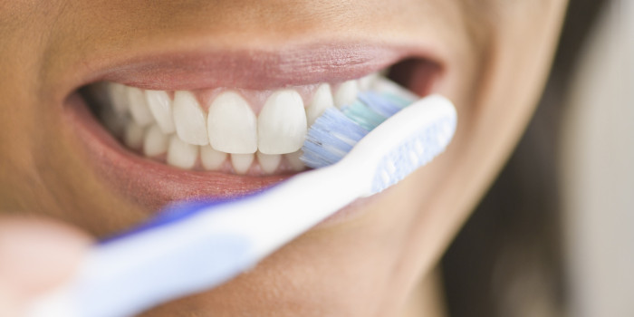 USA, New Jersey, Jersey City, Close-up of woman brushing teeth