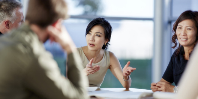 Business people talking in meeting