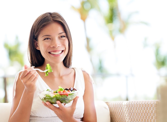 happy-woman-eating-salad