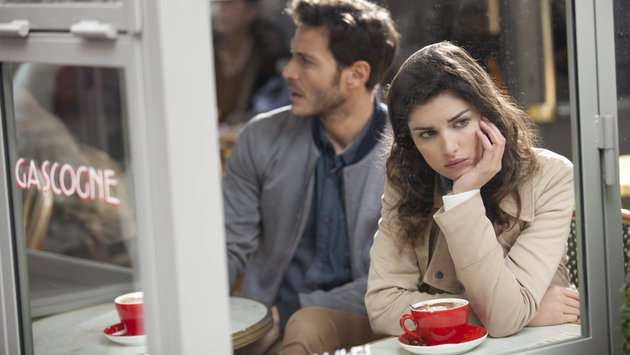 Boring couple in a cafe